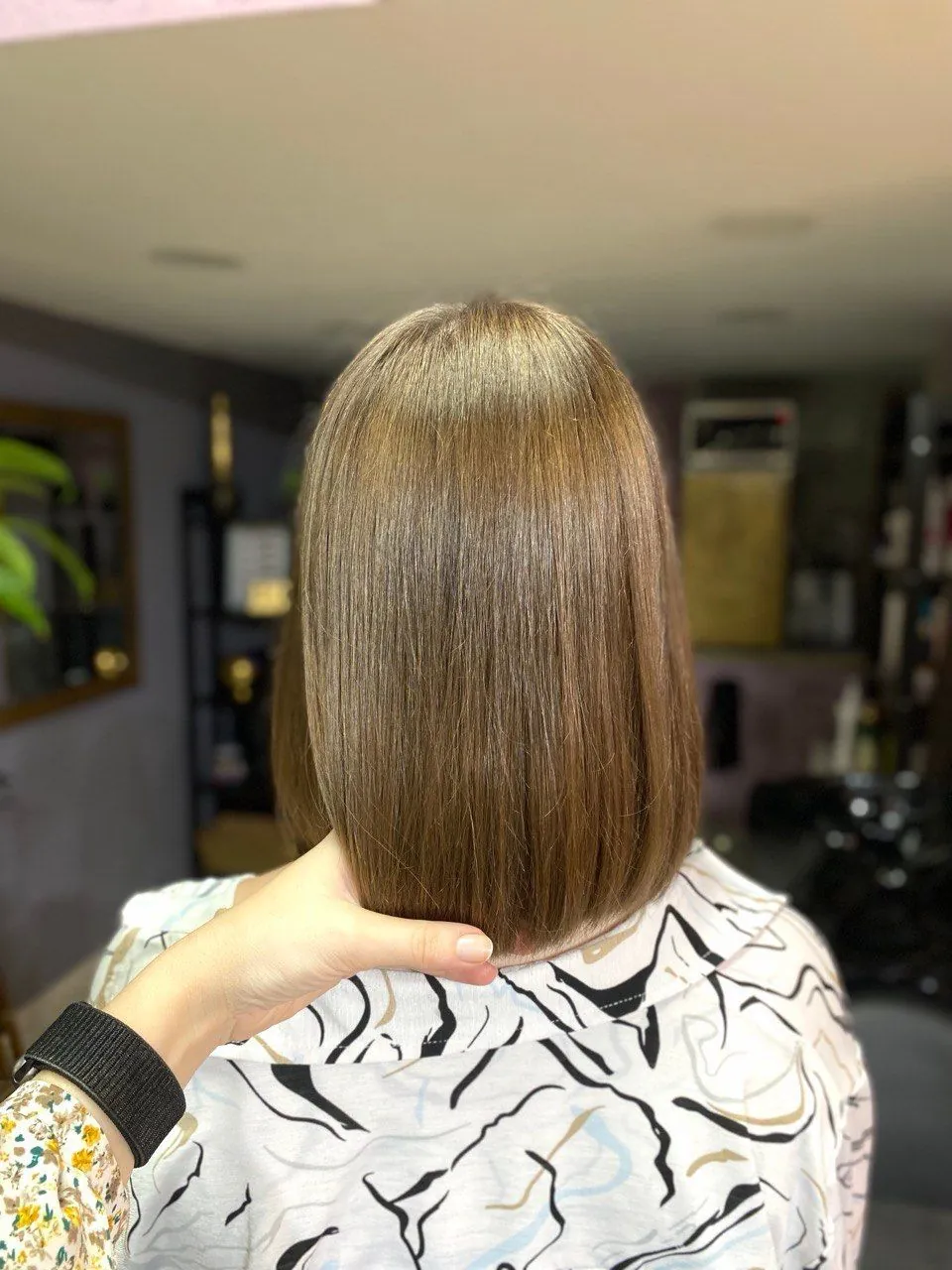 An even bob in a natural light-brown shade